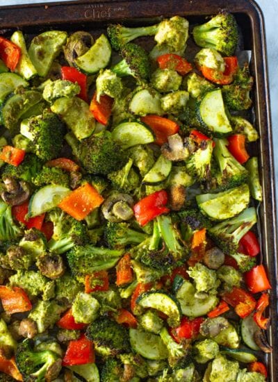 Close-up shot of sheet pan pesto chicken